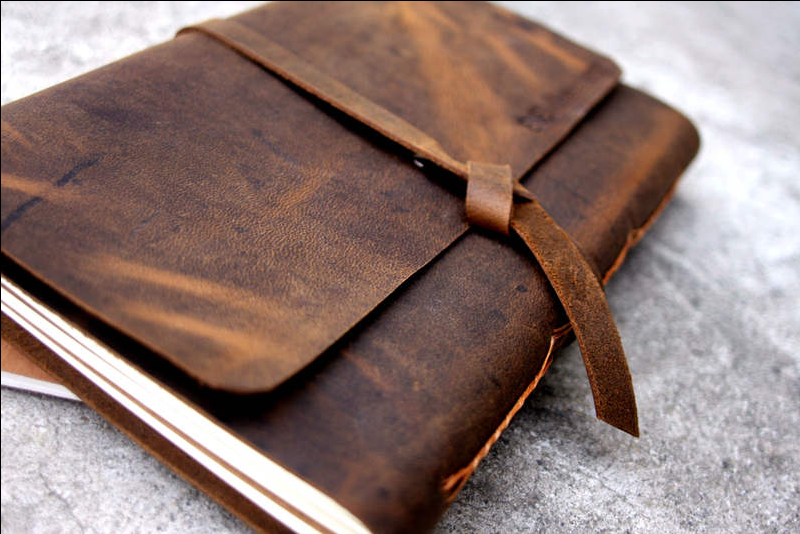 embossed black leather journal with bead tie
